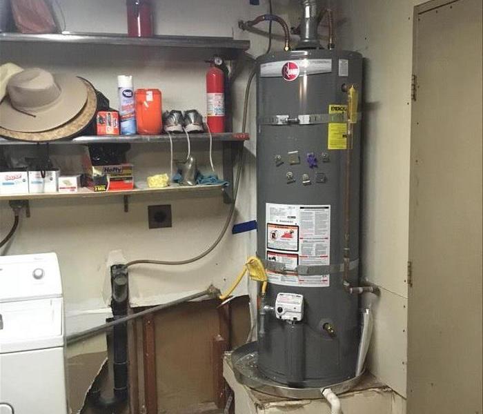 Hot water heater in San Diego California causes water damage, mold, structural damage