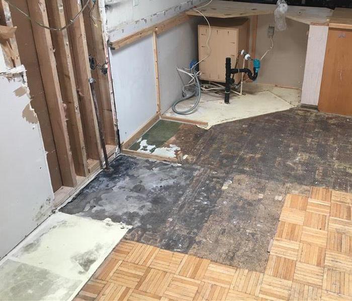 SERVPRO of Santee Lakeside technicians repair fire and smoke damage in kitchen and flooring