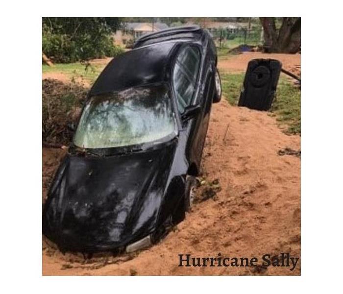 SERVPRO of Santee Lakeside disaster recovery team respond to Hurricane Sally 2020 Pensacola Florida car stuck in muddy hole